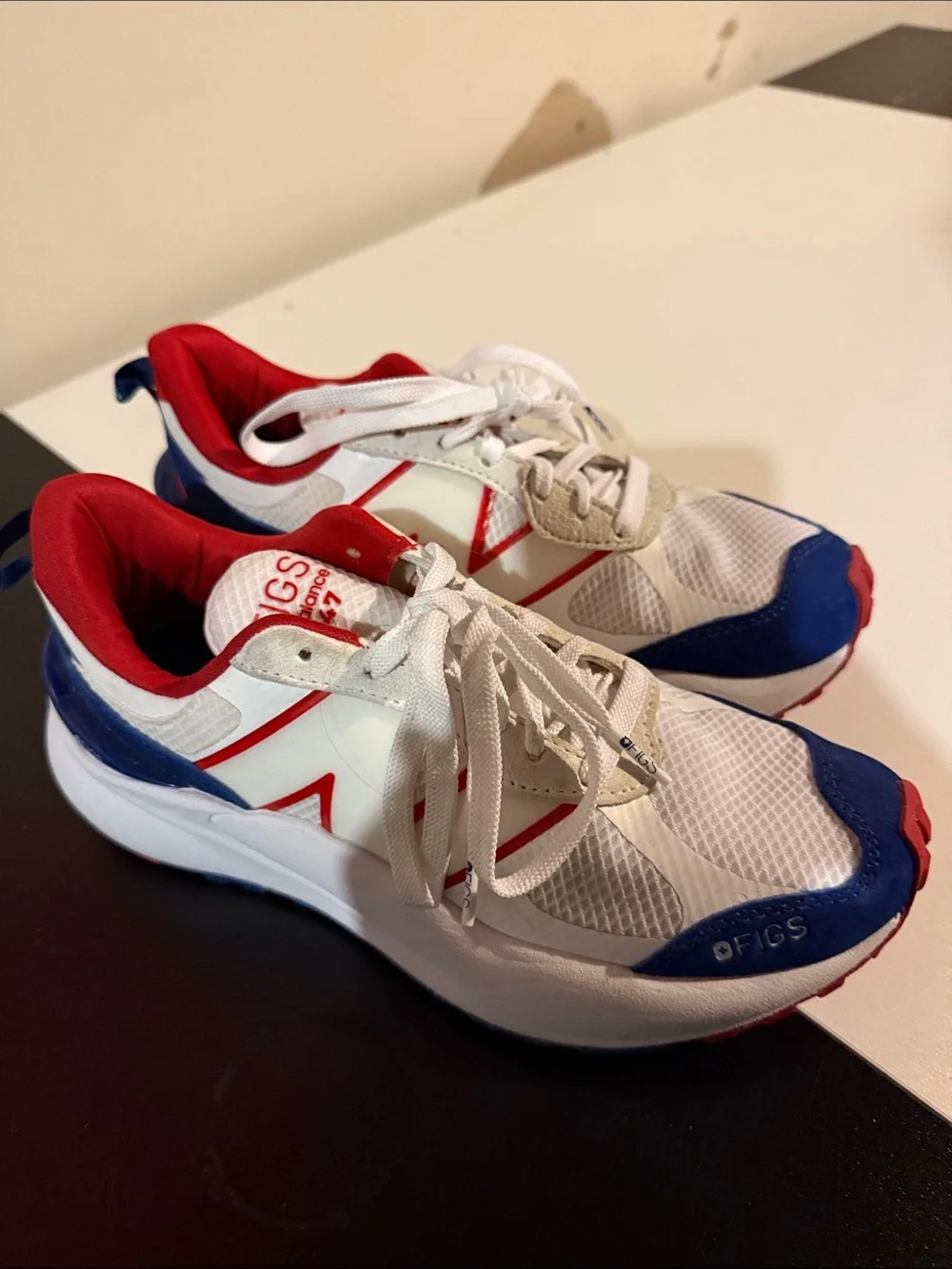 New Balance Kids White Red Blue Sneaker Pair